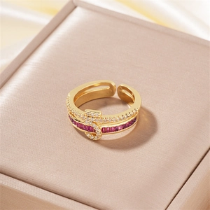 Adjustable golden double-layer butterfly ring with purple baguette crystals and small white diamonds
