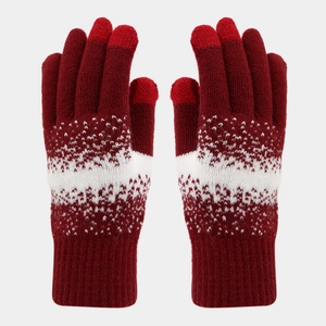 Detail of burgundy knitted touchscreen gloves with white Nordic snowflake patterns