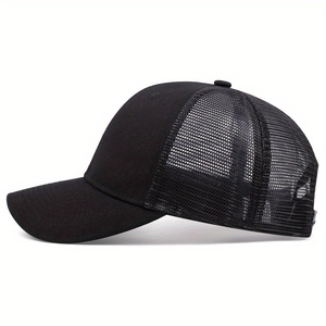 Classic black trucker cap with breathable mesh back and curved brim in side view
