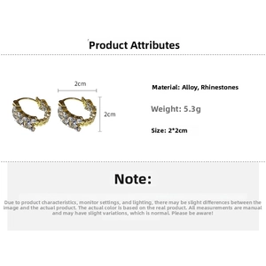 Close-up of gold U-shaped wheat ear earrings with marquise-cut rhinestones, 2x2cm size