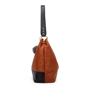 Minimalist large capacity color-block tote bag in brown and black leather with pom-pom