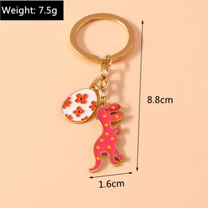 Detailed size parameters of pink dinosaur and dinosaur egg keychain with dimensions and weight