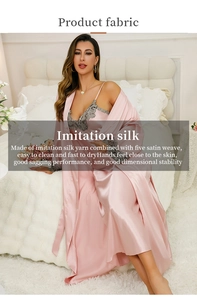 Close-up of pink imitation silk pajamas with elegant grey lace details and satin texture