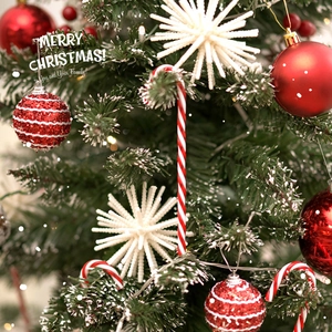 Christmas tree ornaments set with red glitter balls, white stars, and candy canes