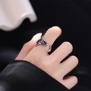 Minimalist silver great white shark open ring featuring vintage textures on hand model