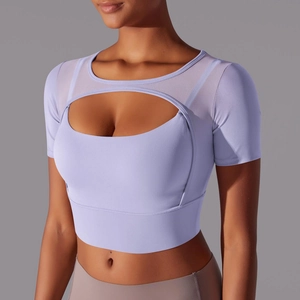 Detail of light purple yoga top with mesh patchwork and sexy hollow-out chest design