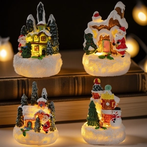 Set of 4 glowing resin Christmas ornaments with Santa, snowman and warm LED lights
