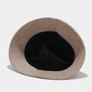 Breathable soft terry cloth bucket hat in beige with contrast black inner lining
