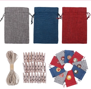Macro shot of 24-piece DIY Christmas advent calendar set with linen bags and wooden clips