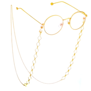 Detail of a gold geometric rhombus metal eyewear chain with stylish round glasses
