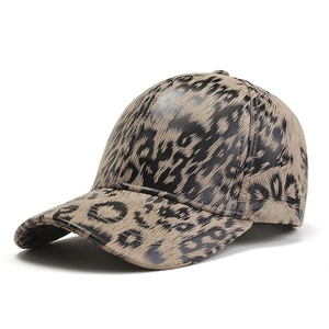 Fashionable leopard print baseball cap with distressed finish and curved brim in dark brown