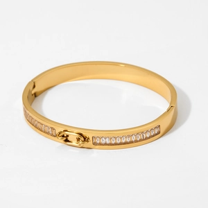 Luxury gold stainless steel bangle with double row crystals and interlocking clasp
