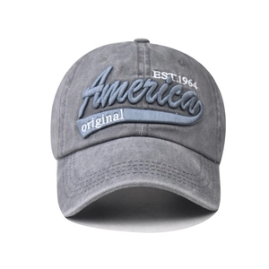 Detailed close-up of America original EST.1964 3D embroidery on washed cotton cap