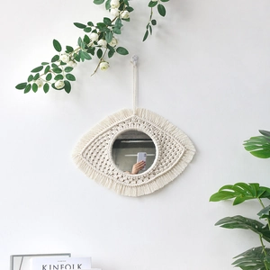Bohemian eye-shaped wall mirror with handmade macrame beige cotton fringe fringe