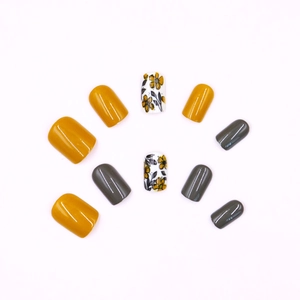 Retro brown flower press-on nails with glossy yellow and grey square round nail tips