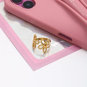 Golden hollow flower open ring in 18K gold stainless steel shown at a 45-degree angle