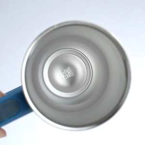 Detailed top view of the SUS 304 stainless steel interior with material stamp for the mug