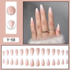 24-piece gradient nude pink almond press-on nails set with long pointed tips
