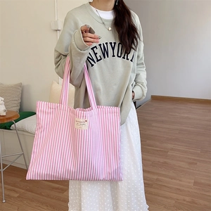 Pink striped canvas tote bag with large capacity for women commuting and daily styling
