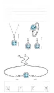 Detail view of 925 silver jewelry set featuring blue square-cut gemstones and zircons