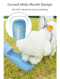 Blue portable pet water dispenser with curved wide-mouth bowl for dogs in outdoor use