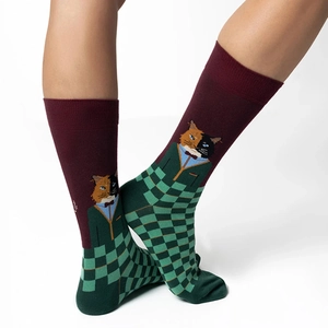 Detail of burgundy and green checkered cotton crew socks featuring a cat in a suit pattern