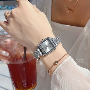 Elegant silver square watch with sparkling rhinestones and matching jewelry accessories