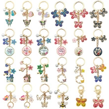 Various colorful metal butterfly and flower keychains for Mother's Day gifts
