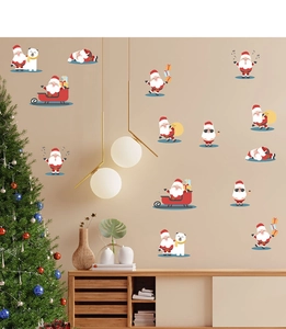 Detailed Christmas wall stickers featuring Santa and polar bears on a living room wall