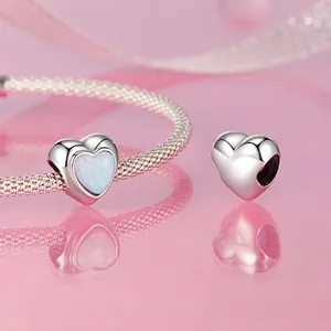 S925 sterling silver heart charm with white opal on elegant silver snake chain bracelet