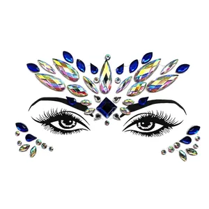 Blue and iridescent rhinestone face jewels sticker for festive party makeup looks