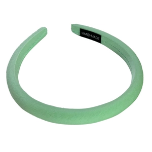Green satin sponge headband with high top design and handmade label for elegant hair styling