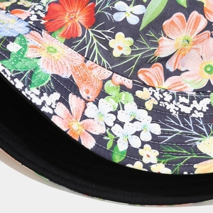 Floral reversible bucket hat with colorful flower print and durable stitching detail
