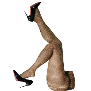 Leopard print tights styled with red bottom black stilettos on white background