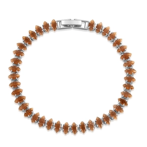 Detail of marquise-cut brown stones with silver metal base and secure watch clasp