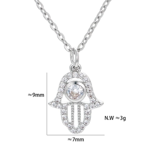 Micro-pave Hamsa Hand necklace pendant in silver with 9x7mm dimensions and 3g weight