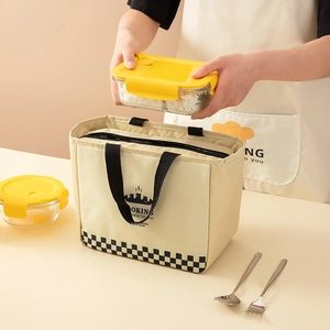 Japanese style insulated lunch bag with checkered bottom and glass food container