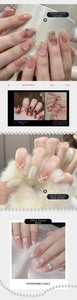 Close-up of premium press-on nails featuring camellia flower and pearl details