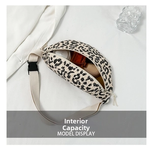 Internal view of leopard print straw belt bag with daily essentials and perfume