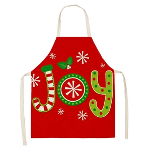Red Christmas linen apron with JOY candy cane typography and snowflake patterns
