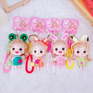 Set of four cute animal cartoon doll keychains with movable bodies and matching hand straps
