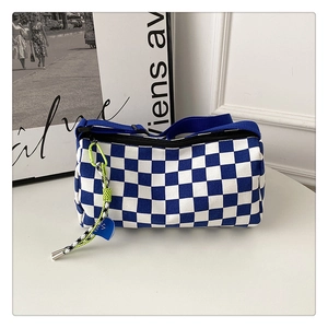 Blue and white plaid canvas crossbody bag with adjustable strap and woven letter pendant