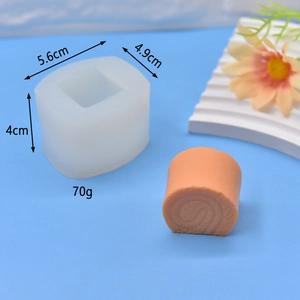 Detailed view of 5.6x4.9x4cm silicone swiss roll mold with finished orange resin art
