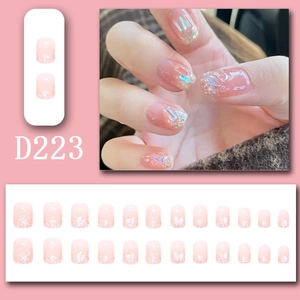 Close-up of pink gradient press-on nails D223 with glitter and aurora sequins