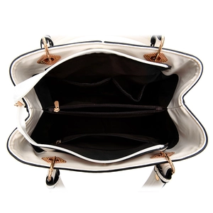 Interior view of white handbag with multiple compartments, black lining and rose gold hardware