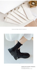 Detailed view of white lace floral socks and black sheer polka dot mesh socks with ruffles