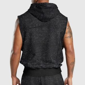 Rear view detail of men's distressed floral print hooded vest showing fabric texture