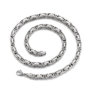Silver stainless steel Byzantine chain necklace for men with lobster clasp on white background