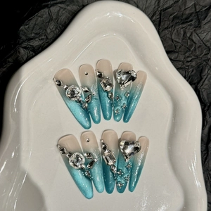 Handmade blue cat eye long almond press on nails with silver glitter and rhinestone hearts