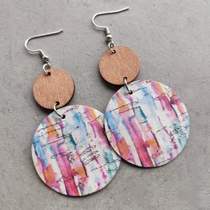 Artistic cork earrings with colorful painted patterns and round geometric wood shapes